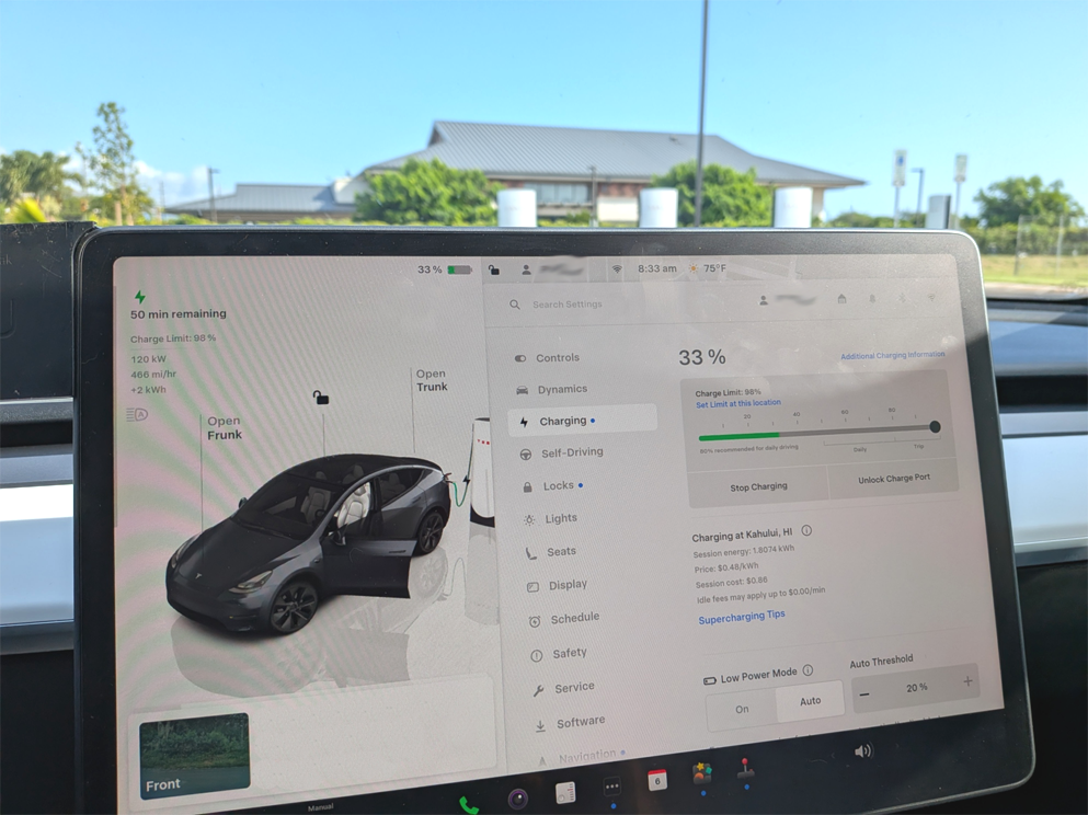 Tesla charging screen in car